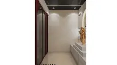 Cream arched mandir beneath a dark ceiling — view 2